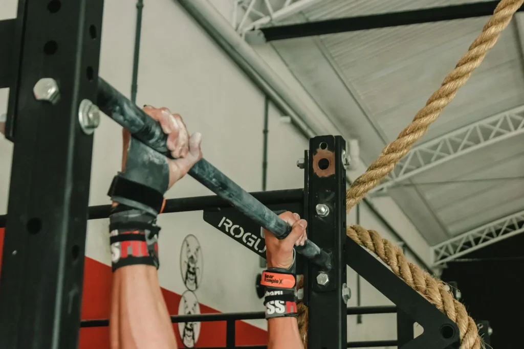 User performing pull-ups on a fit home gym power tower during testing